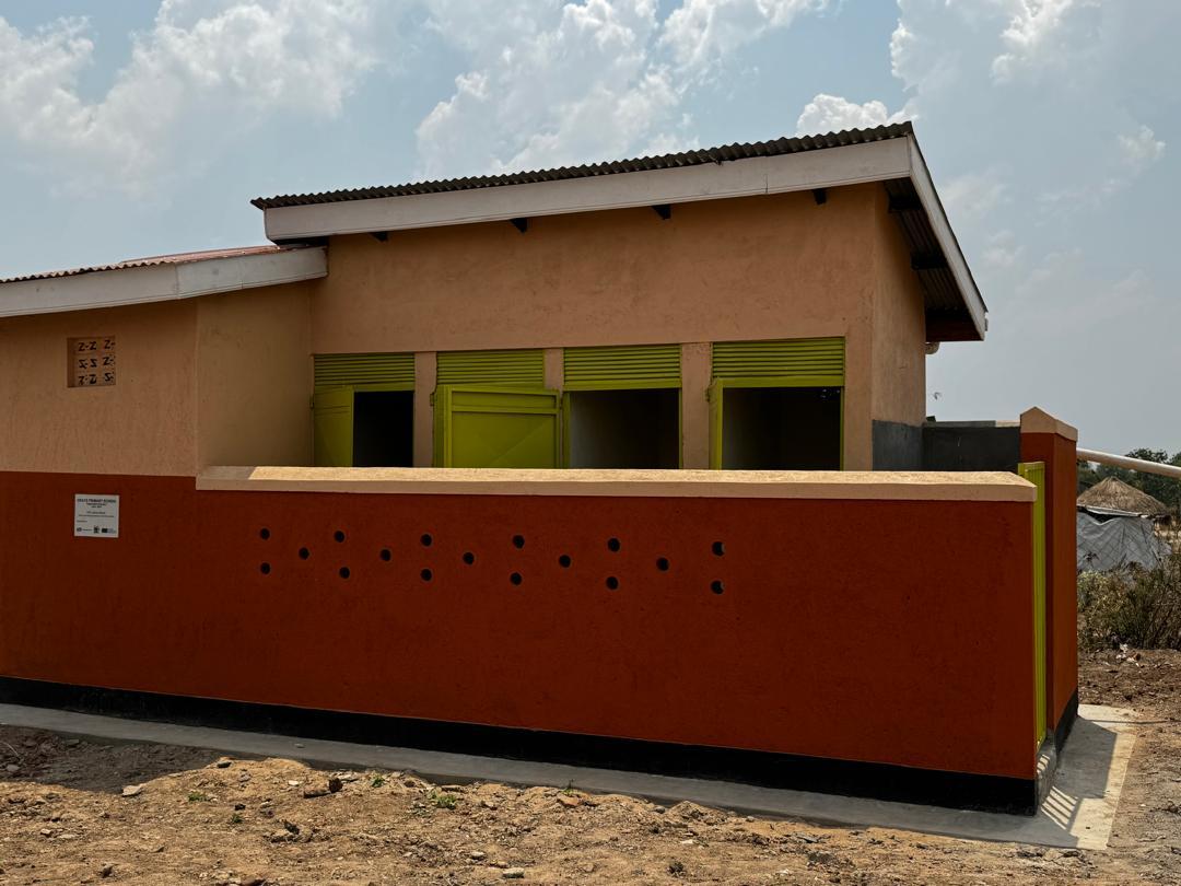 Grace Primary School — Classroom Block & VIP Latrine