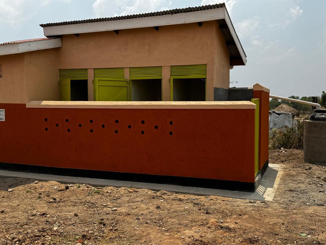 Grace Primary School — Classroom Block & VIP Latrine